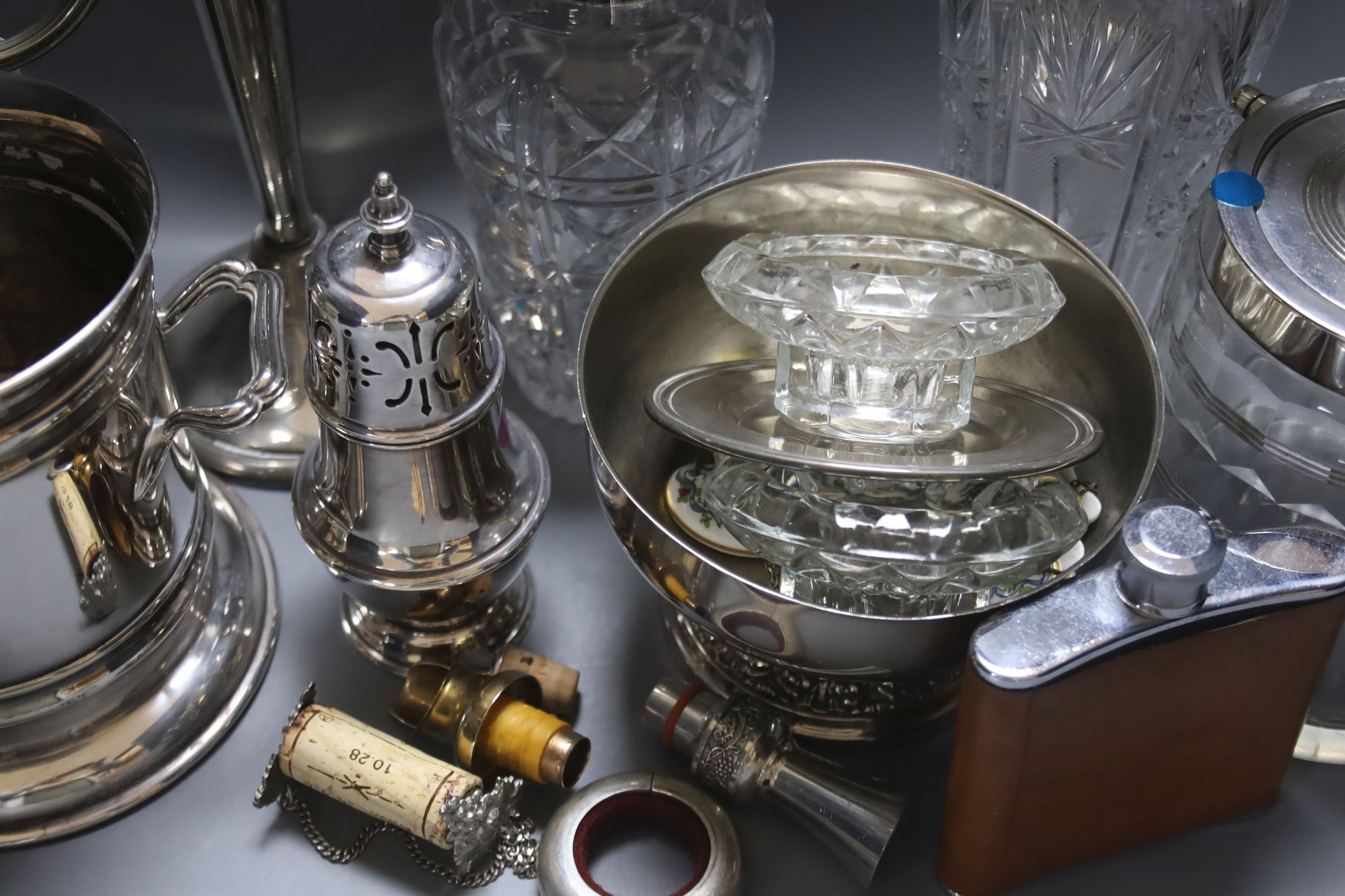 Assorted plated wares including a mounted glass biscuit barrel.